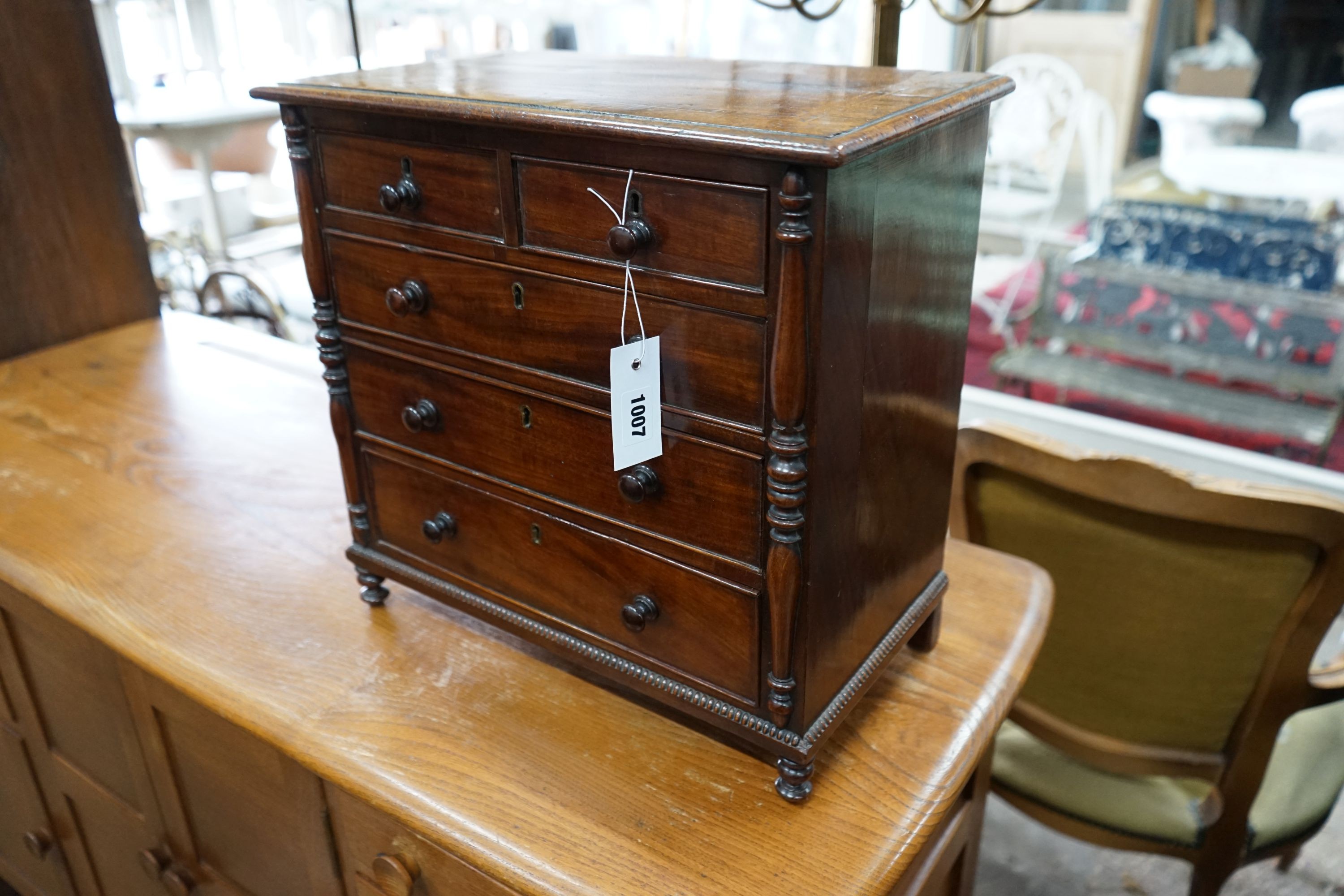 A Victorian banded mahogany miniature chest, width 43cm, depth 24cm, height 41cm